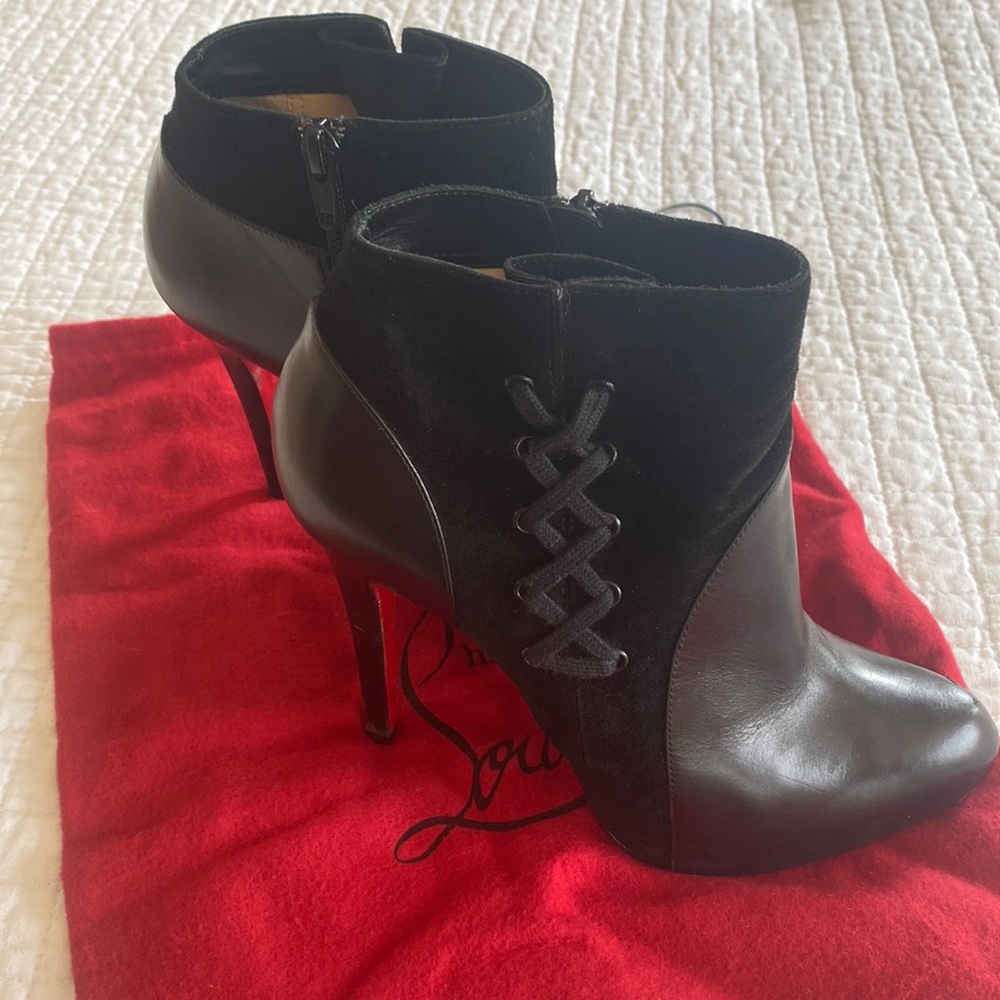 Christian Louboutin “lace up” booties sz 37